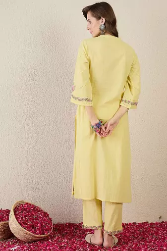 Women Floral Embroidered Cotton Kurta with Trousers