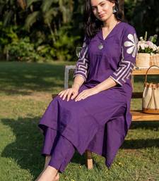 women embroidered pleated thread work  cotton kurta with trousers