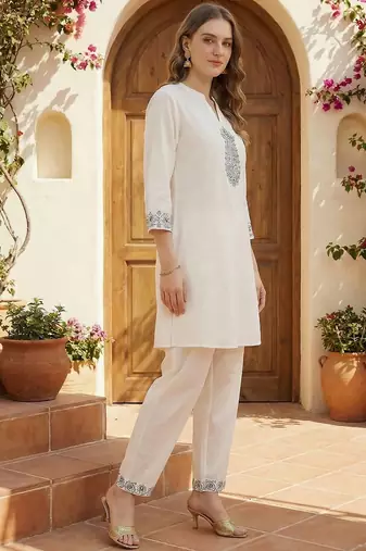 women ethnic motifs embroidered regular thread work  cotton kurti with trousers