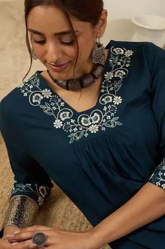 women ethnic motifs embroidered  cotton kurta with trousers