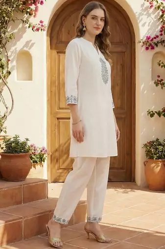 women ethnic motifs embroidered regular thread work  cotton kurta with trousers
