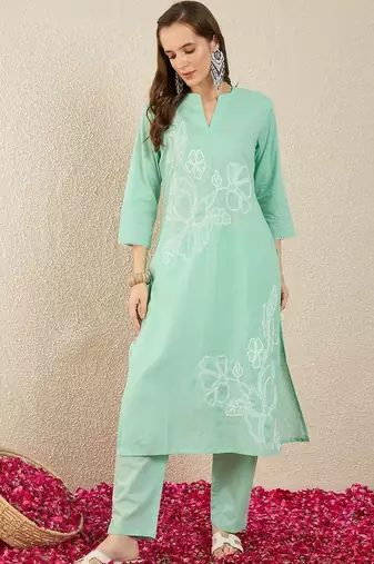 women floral embroidered regular thread work  cotton kurta with trousers