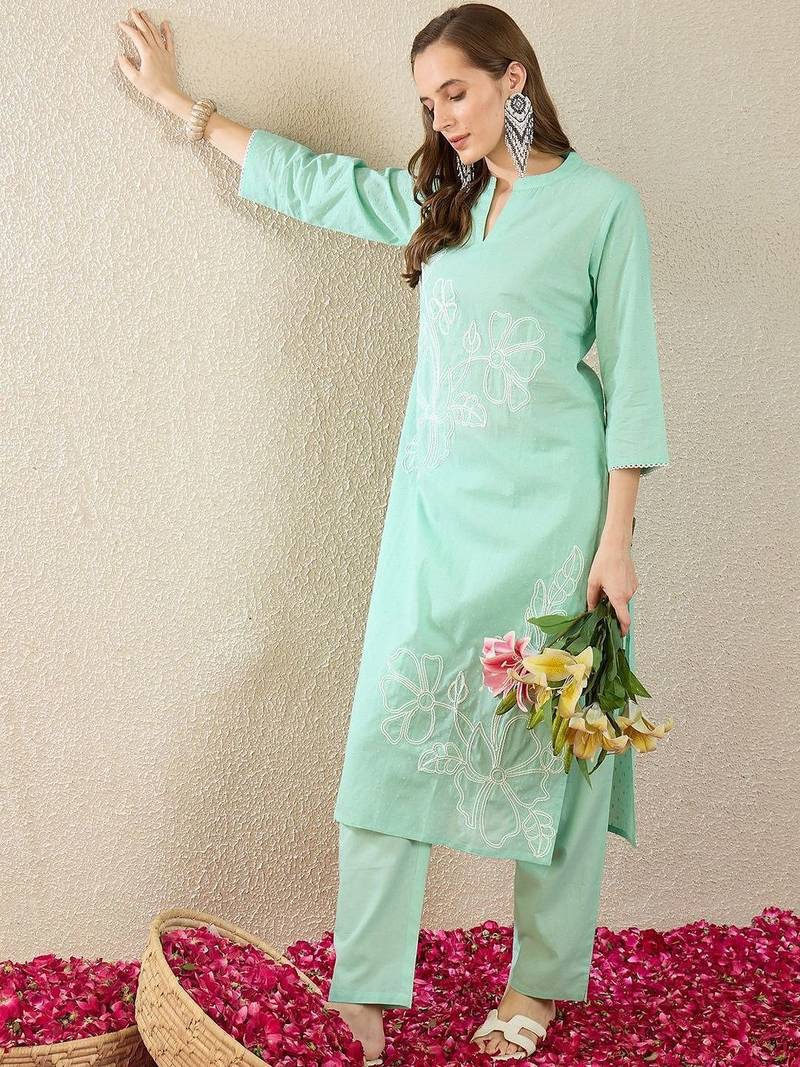 women floral embroidered regular thread work  cotton kurta with trousers