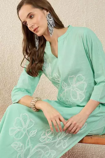 women floral embroidered regular thread work  cotton kurta with trousers