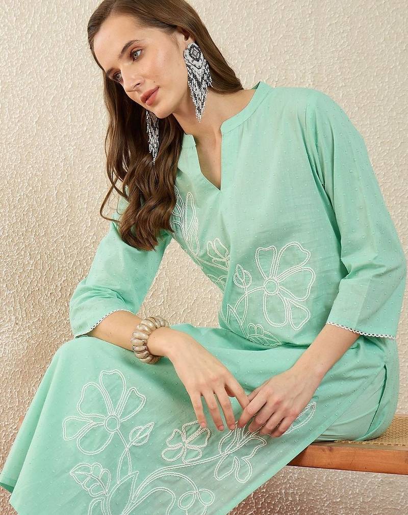 women floral embroidered regular thread work  cotton kurta with trousers