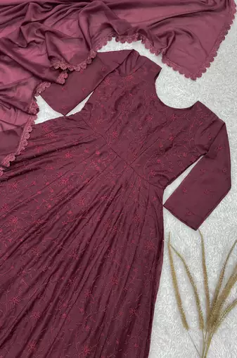 maroon color thread embroidery work with gpo lace border georgette gown set