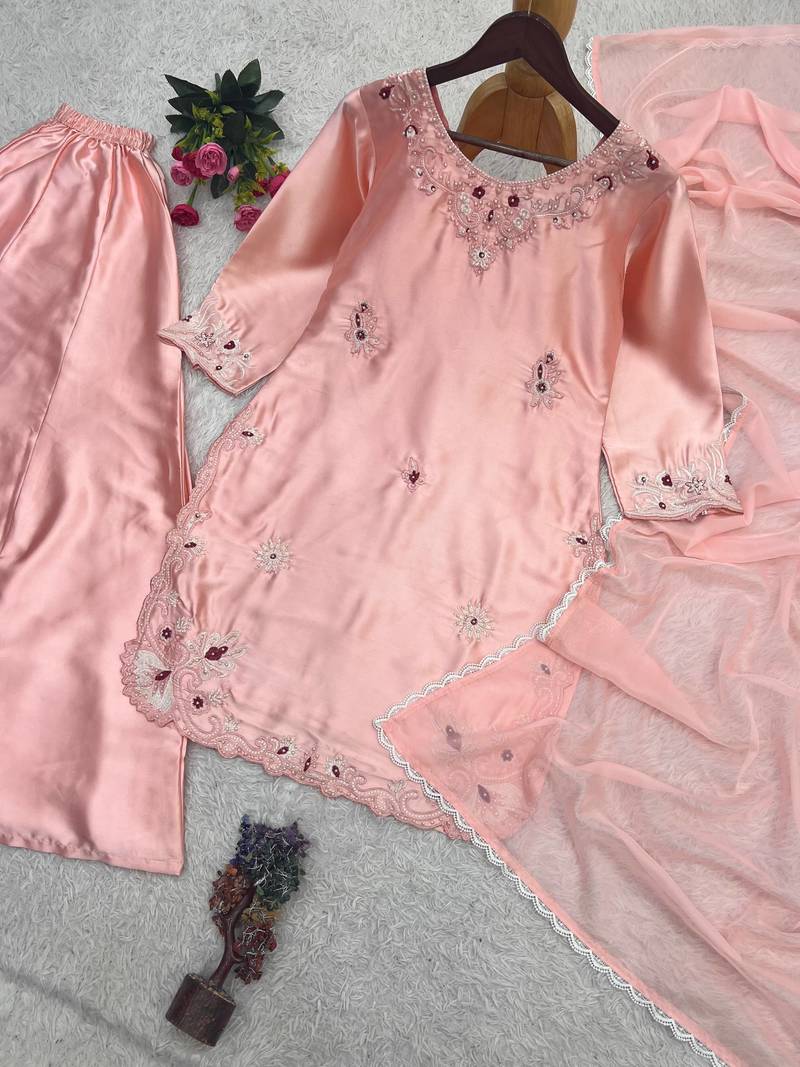 peach color embroidery work with stone handwork and cutwork kurti palazzo set