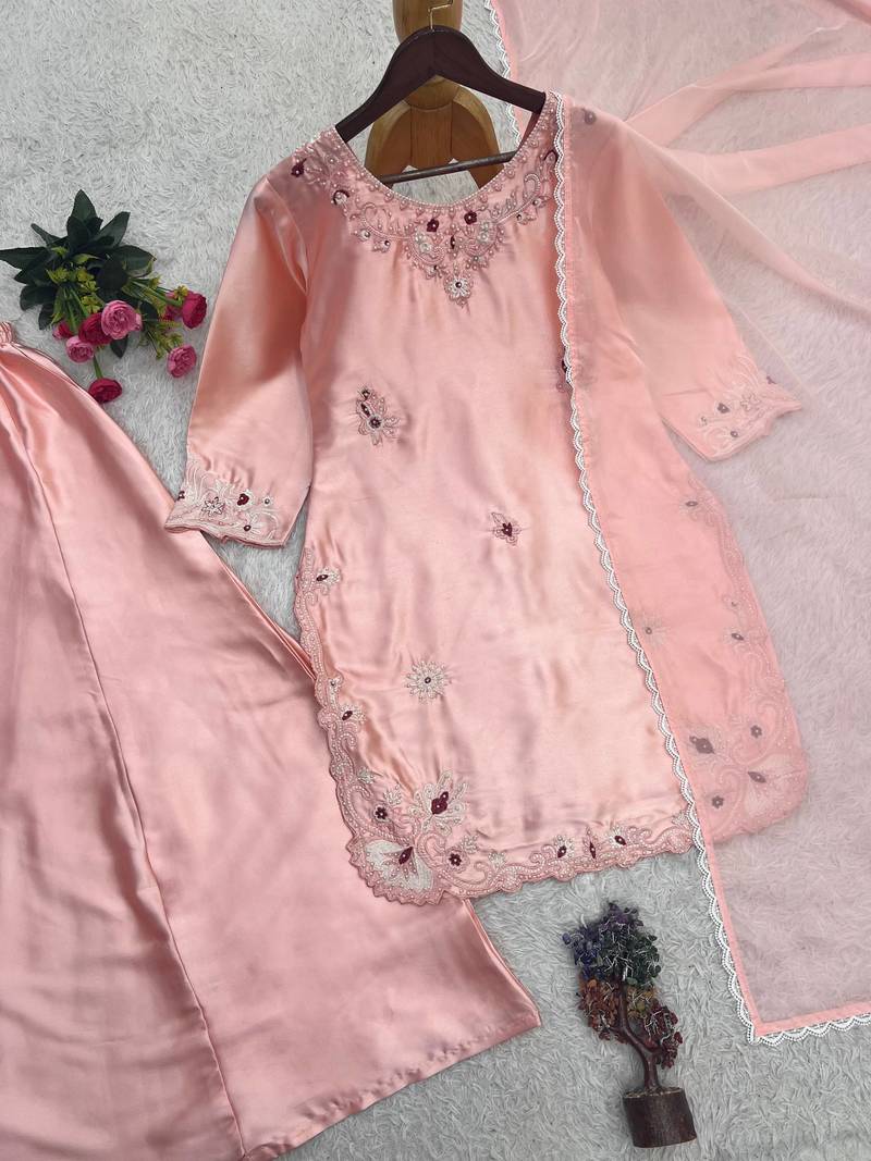 peach color embroidery work with stone handwork and cutwork kurti palazzo set