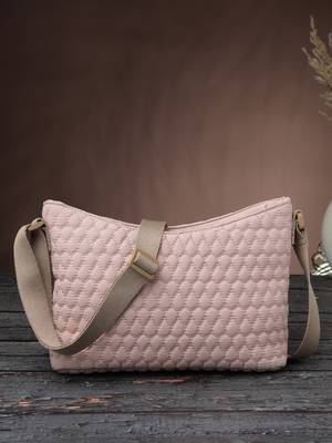   pastel pink polyester quilted sling bag 1