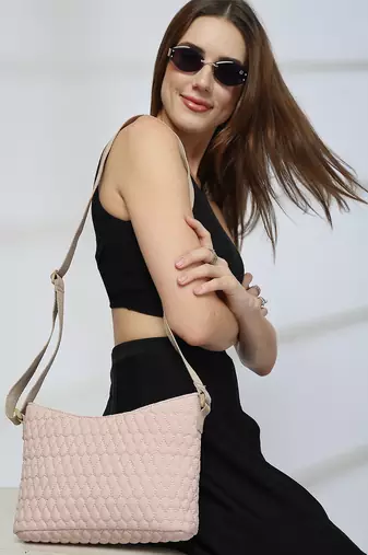  pastel pink polyester quilted sling bag