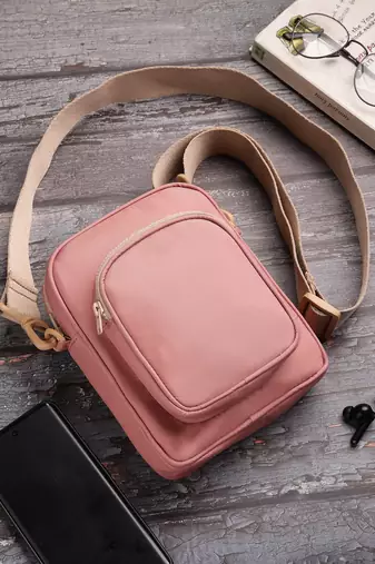   dusty rose pink polyester solid sling bag