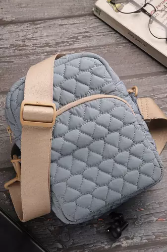   powder blue polyester teardrop quilted sling bag