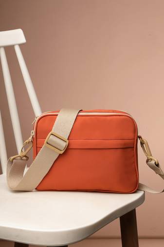   burnt orange polyester solid sling bag