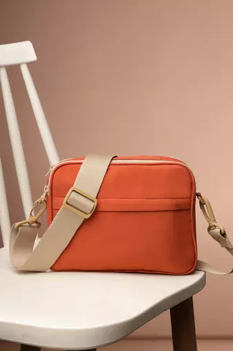   burnt orange polyester solid sling bag