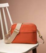   burnt orange polyester solid sling bag