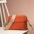   burnt orange polyester solid sling bag