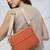   burnt orange polyester solid sling bag
