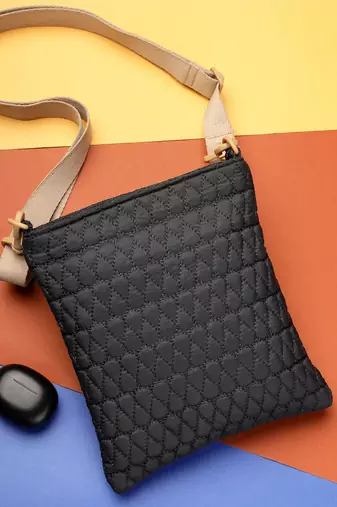   black polyester teardrop quilted sling bag