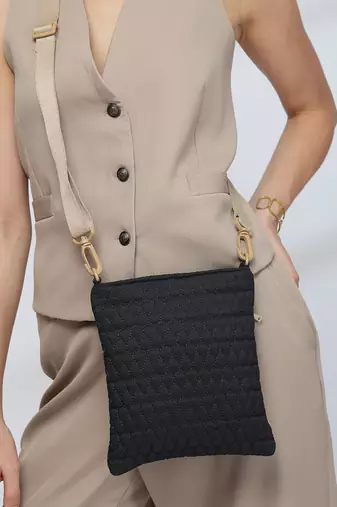   black polyester teardrop quilted sling bag