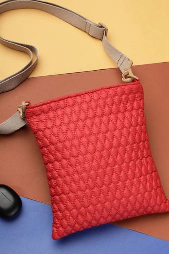   red polyester teardrop quilted sling bag
