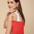   red polyester teardrop quilted sling bag