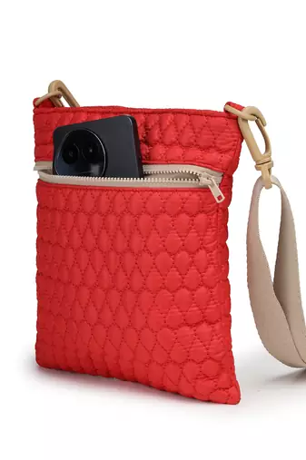   red polyester teardrop quilted sling bag
