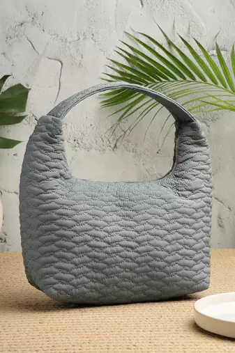   dusty blue polyester wave quilted handheld bag
