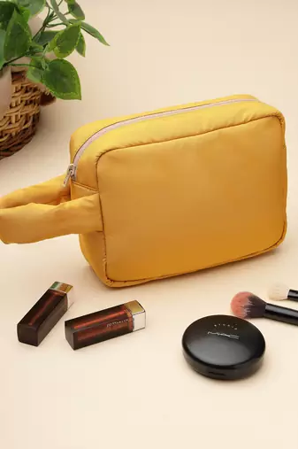   mustard yellow polyester travel pouch