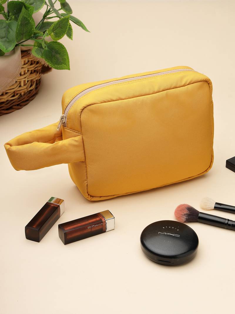   mustard yellow polyester travel pouch