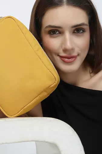   mustard yellow polyester travel pouch