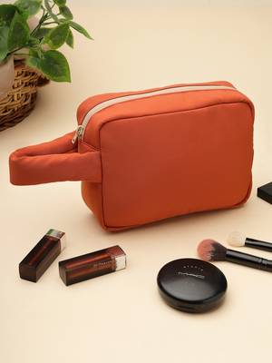   burnt orange polyester travel pouch 1