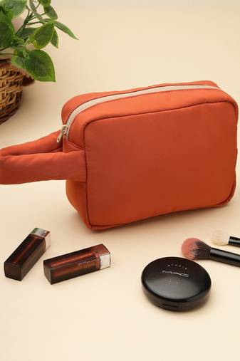   burnt orange polyester travel pouch