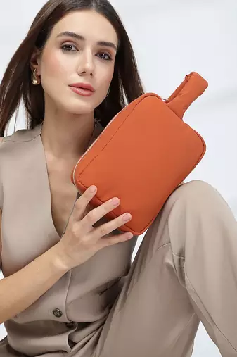   burnt orange polyester travel pouch