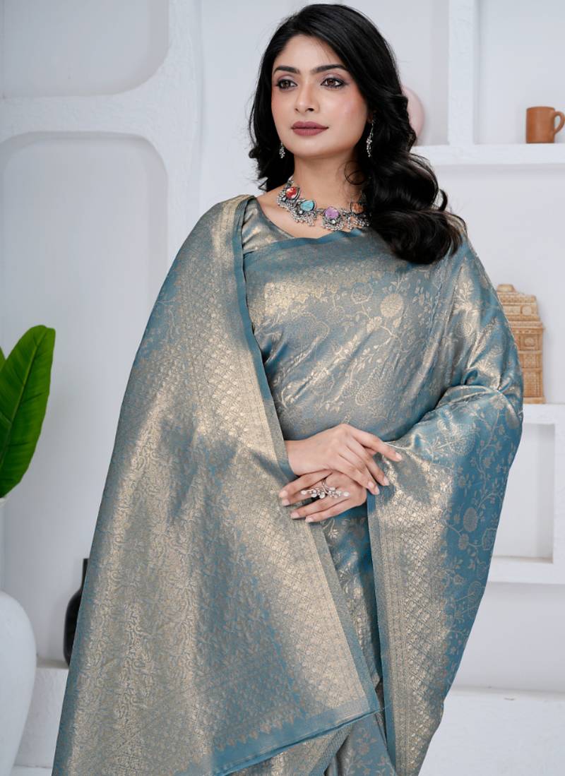 royal sky blue colour all over woven zari tissue silk blend party wear saree with blouse