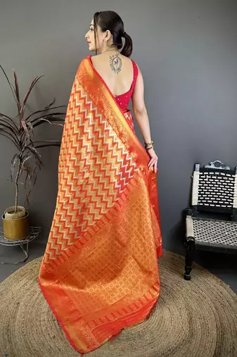women's red soft silk blend saree with unstitched blouse