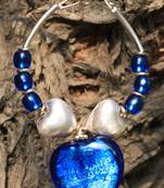 Sterling silver and Electric Blue hoops.