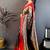 Women's green & purple soft silk banarasi saree with unstitched blouse