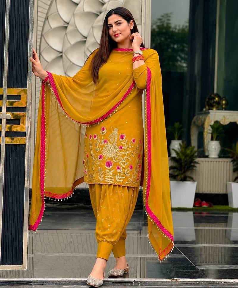 amber color embroidery and sequin work faux georgette kurti dhoti set