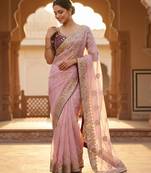 Women's pink satin silk partywear saree with unstitched blouse