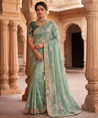 Women's pista satin silk partywear saree with unstitched blouse 1