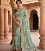 Women's pista satin silk partywear saree with unstitched blouse