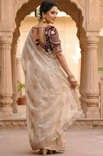 women's rust satin silk blend partywear saree with unstitched blouse