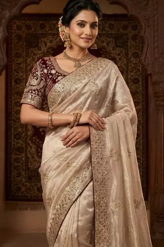 women's rust satin silk blend partywear saree with unstitched blouse