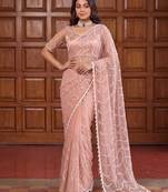 Women's rust net partywear saree with unstitched blouse