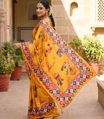 Women's yellow chinnon partywear saree with unstitched blouse