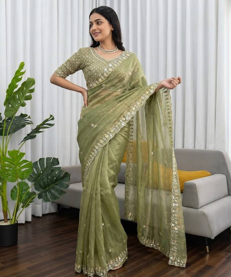 Women's pista silk partywear saree with unstitched blouse