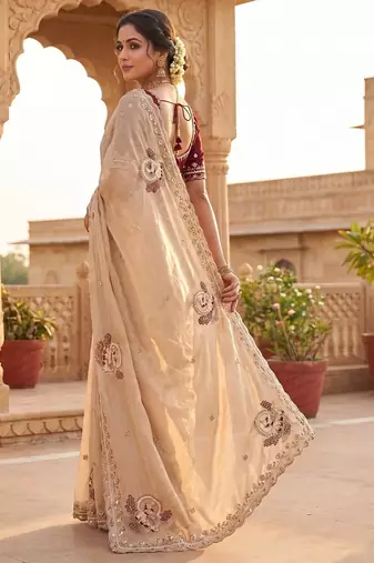 women's cream satin silk blend partywear saree with unstitched blouse