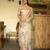 Women's rust silk partywear saree with unstitched blouse