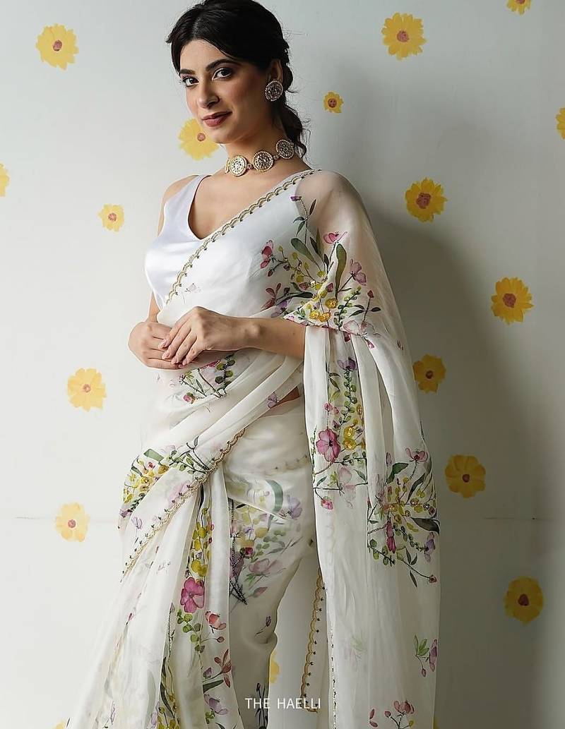Women's white silk partywear saree with unstitched blouse