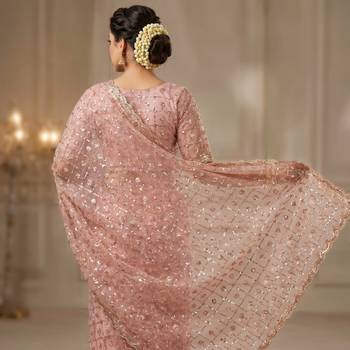 Women's pink net partywear saree with unstitched blouse 3